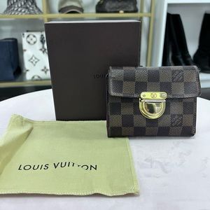 Louis Vuitton monogram koala wallet; see pictures for wear